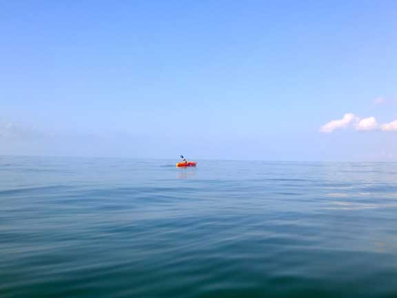 Kayaking in the calm atlantic off Folly Beach